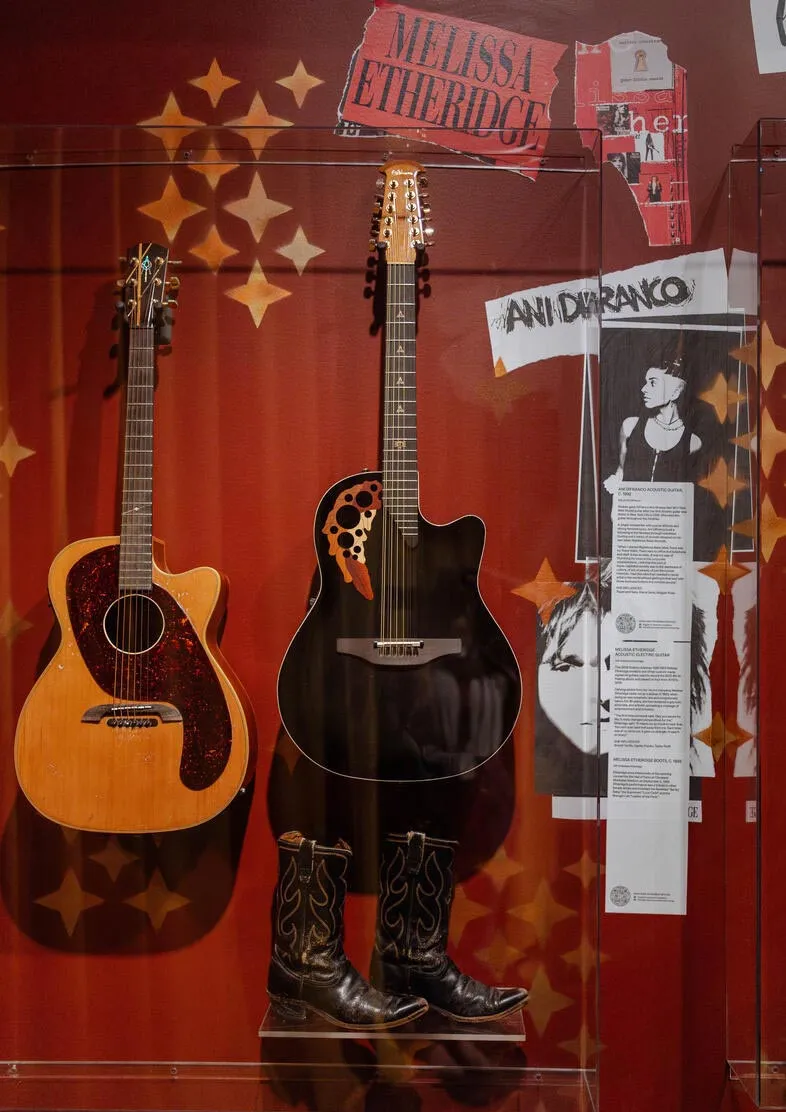 Melissa Etheridge boots and guitar